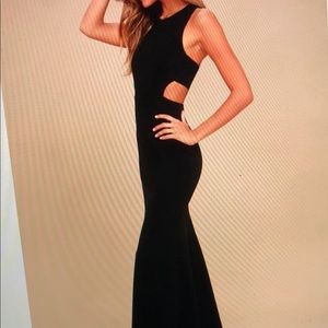 Beautiful black classic dress with cut outs!